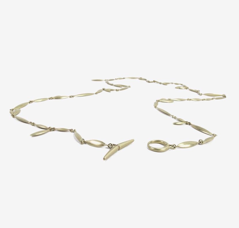 TED MUEHLING 10K APPLESEED NECKLACE