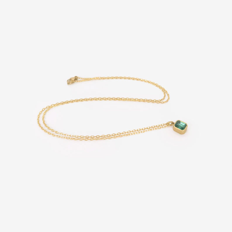 LOLA BROOKS 18K & TINY EMERALD-CUT ETHIOPIAN EMERALD PENDANT, .82CT