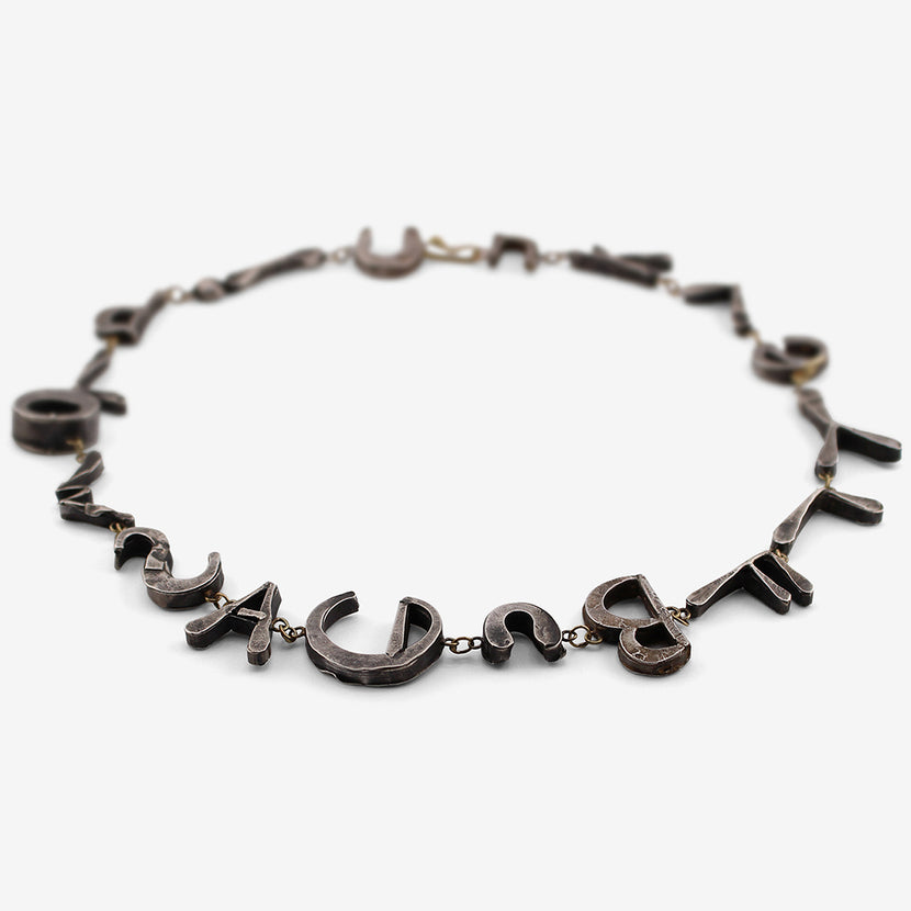 JUDY GEIB 18K & SILVER TEA LENGTH LETTER NECKLACE