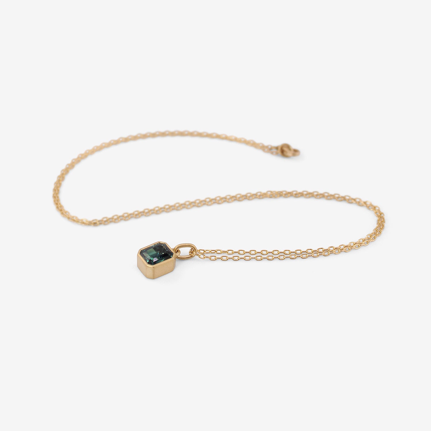 LOLA BROOKS 18K & EMERALD-CUT TEAL BLUE MADAGASCAR SAPPHIRE PENDANT, 1.97CT