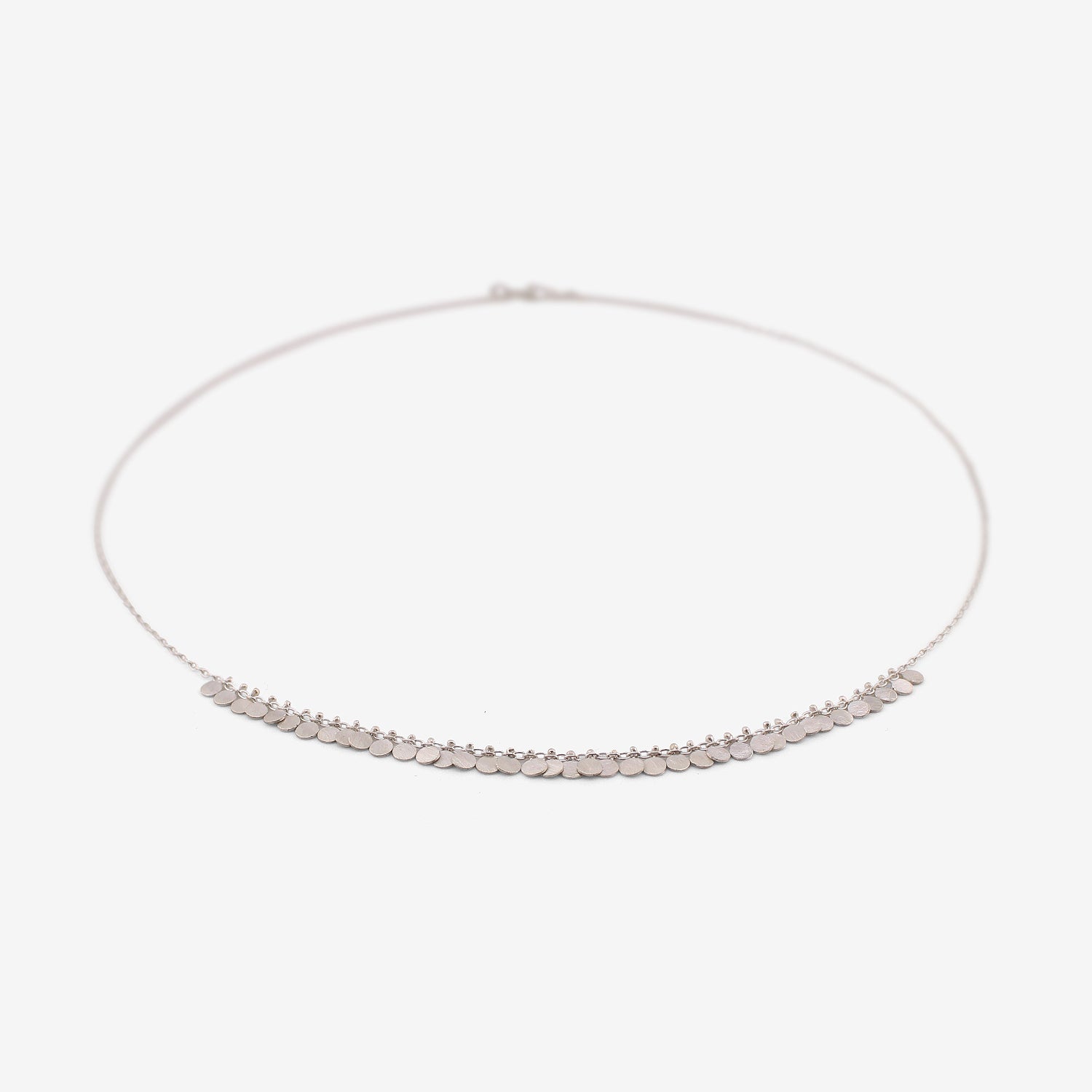 SIA TAYLOR STERLING SILVER TINY DOTS ARC NECKLACE