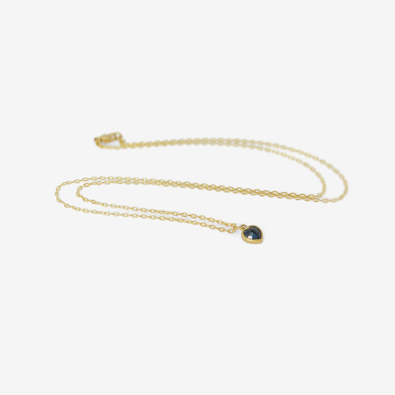 LOLA BROOKS 18K & BLUE SAPPHIRE SWEETHEART PENDANT, .55CT